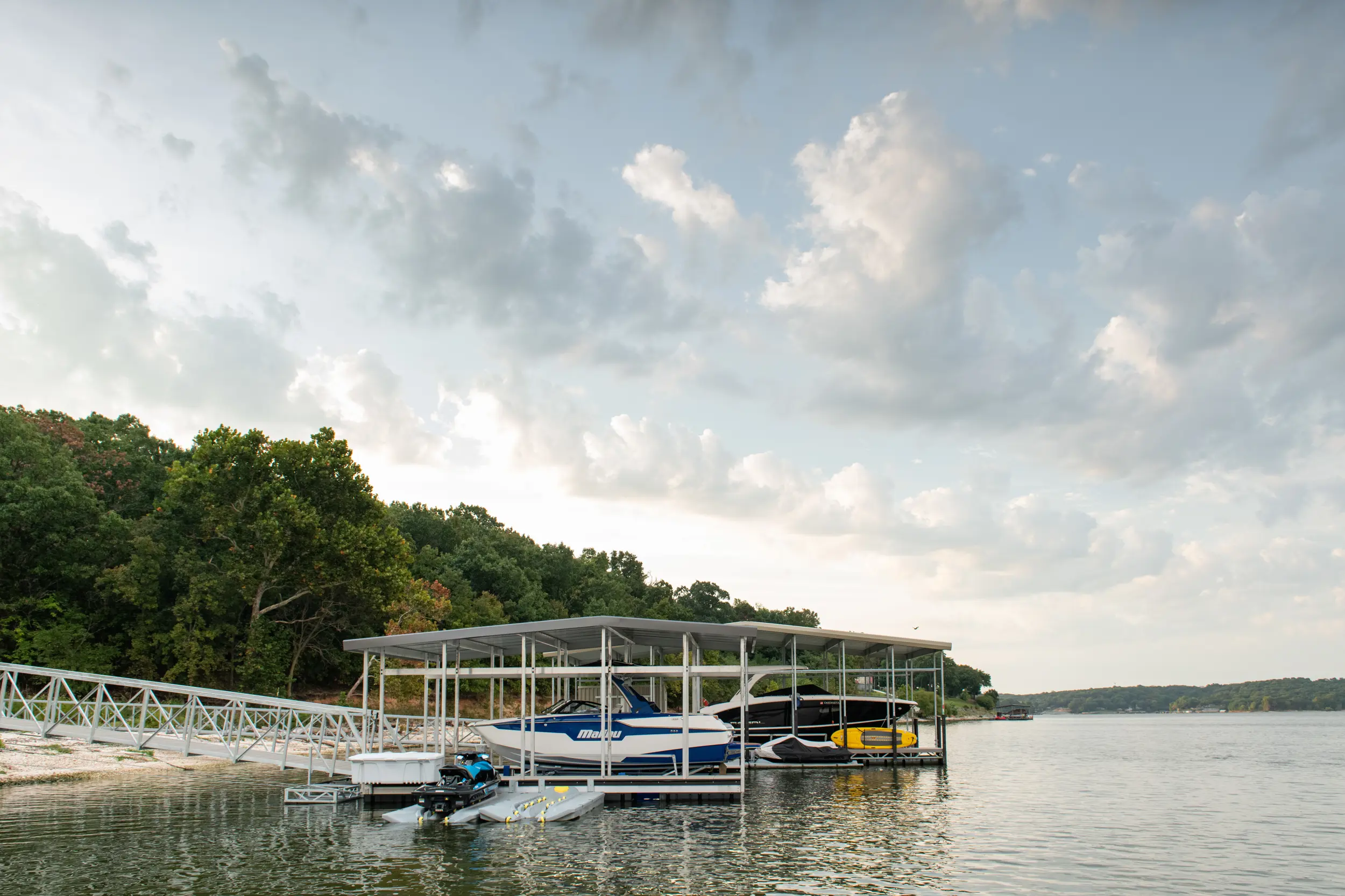 Dock protection and HydroHoist boat lift equipment near waterfront dock